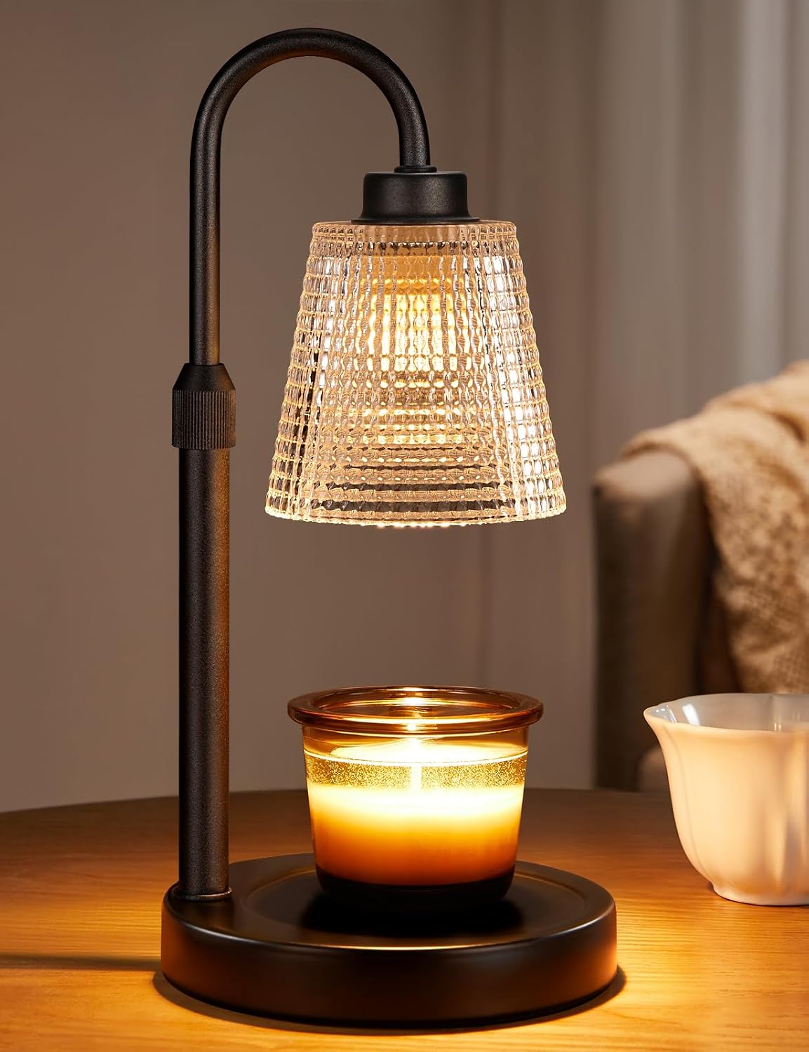Matte black candle warmer lamp with polka-dotted glass shade